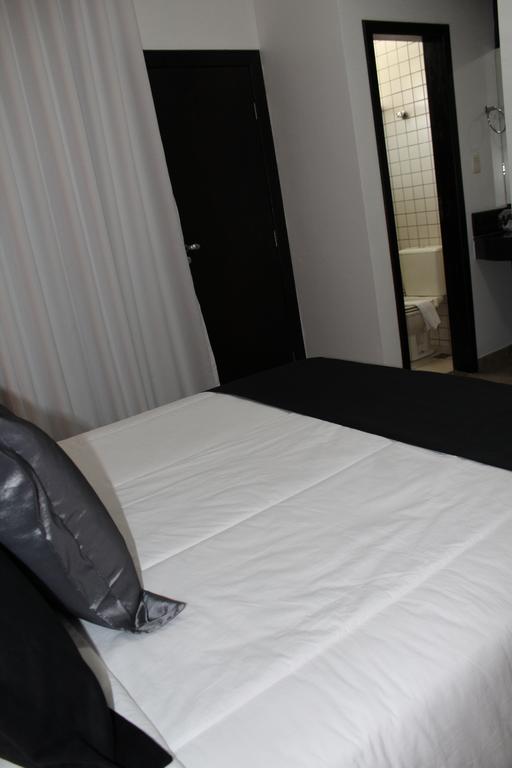 Hotel Dom Henrique Timóteo المظهر الخارجي الصورة